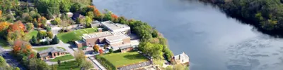 Aerial photo of water treatment plant next to river