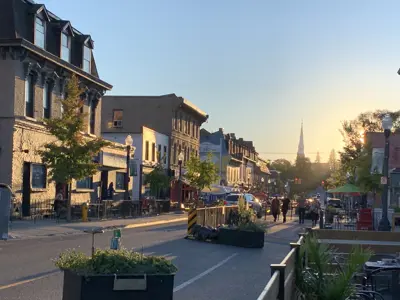 Patios along Hunter Street West at sunset