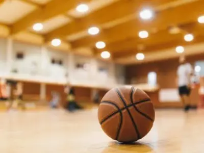 Close up of basketball on a gym floor
