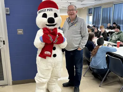 Mayor Leal stands with Snofest Pete during pancake breakfast