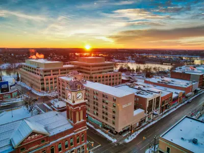 Aerial view of central Peterborough in winter at sunrise, facing east
