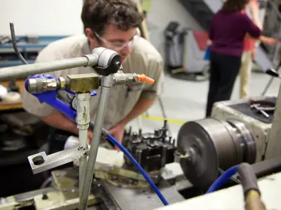 person working with machinery 