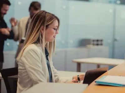 Person provides assistance at customer service desk