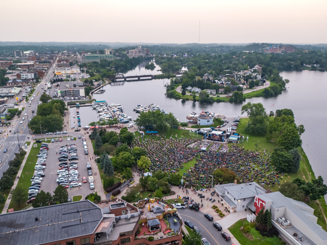 An Aerial photo of Del Crary Park filled with spectators watching a concert.